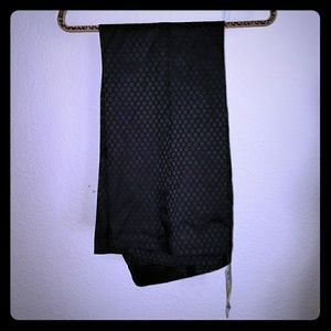 Satin black polka dot pants.